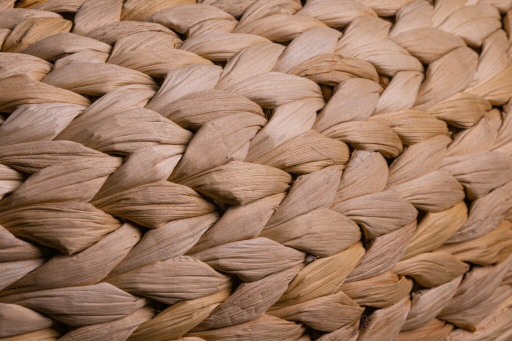 Detailed close-up of natural woven wicker texture, ideal for background or design elements.